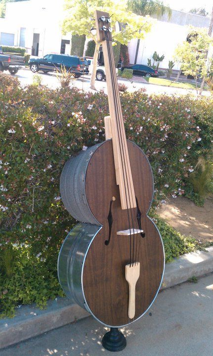 Музыкальный инструмент из корыта (6 фото)